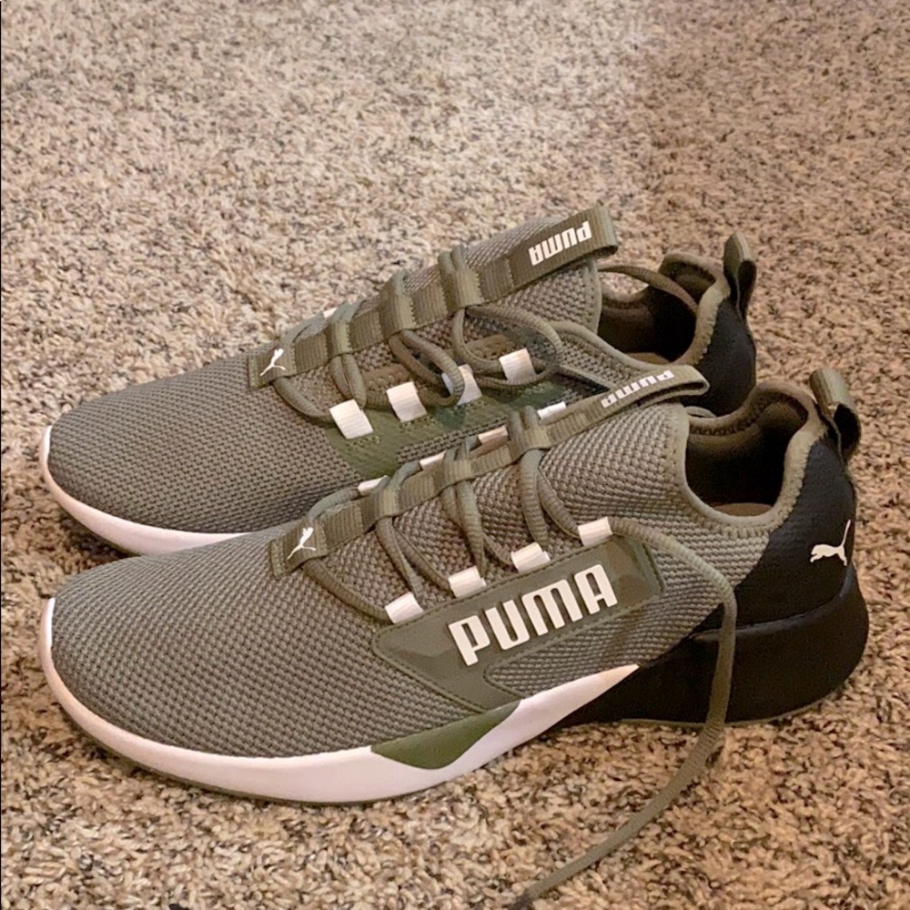 Men’s olive green and white PUMA sneakers